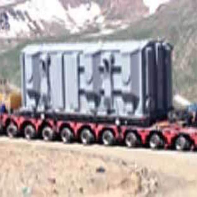 Транспортировка силовых трансформаторов (160 т и 280 т) из Хоргоса (КНР) в Таджикистан: перевозка на низкорамной платформе, получение разрешений, полицейское сопровождение и прокладка горного маршрута.